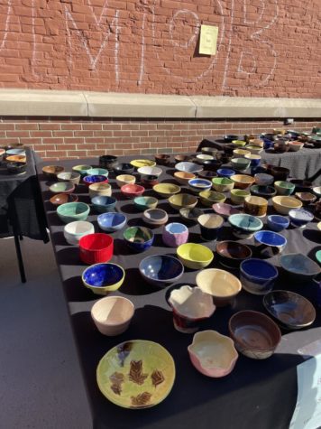 Ceramic Bowls displayed to benefit the Empty Bowls Program. Art Club students helped contribute. 
